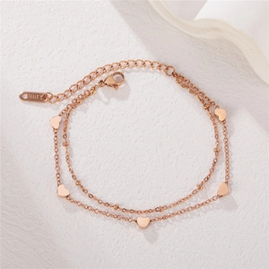 Elegant rose gold double-layer stainless steel bracelet with heart charms and beads