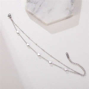 Double-layered silver titanium steel heart bracelet with 18KGP tag and lobster clasp