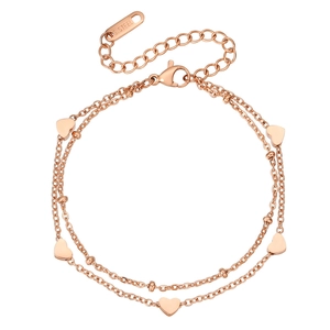 Elegant rose gold double-layered titanium steel heart bracelet for women on white background