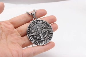 Detailed relief of Russian Air Force military emblem on vintage titanium steel pendant