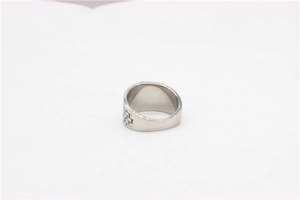 Detailed close-up showing geometric brick texture on mens silver stainless steel ring