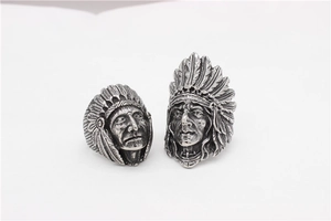 Macro shot of vintage silver Indian Chief ring with detailed feathered headpiece