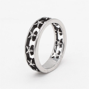 Vintage oxidized hollow star titanium steel ring for men with a silver finish