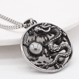Collier vintage en acier inoxydable avec pendentif dragon circulaire creux et chaîne