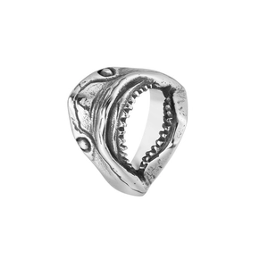 Detailed view of vintage shark jaw ring showing sharp teeth and antique silver texture