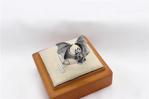 Detailed close-up of retro gothic bat wing ring in vintage silver stainless steel finish