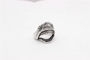 Macro shot of retro silver shark head ring showing detailed teeth and S925 engraving