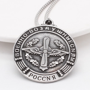Vintage stainless steel Russian Air Force round pendant necklace with embossed wings design