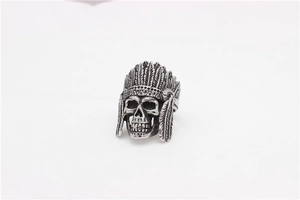 Detailed view of vintage steel skull ring with an ornate Indian feather headdress design