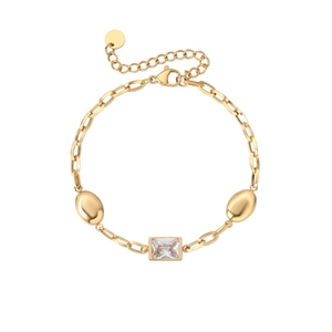 Detail view of gold chain bracelet featuring rectangular zircon and oval metal beads