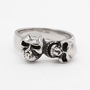 Vintage silver skull ring with triple skeleton design in polished stainless steel