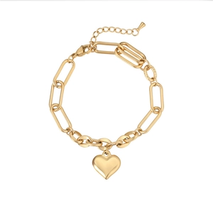 Detail view of gold heart pendant bracelet with various linked chains and lobster clasp