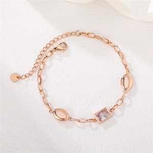 Elegant rose gold titanium steel bracelet with oval metal plate and rectangular zircon stone