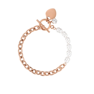 Detail of rose gold titanium bracelet with pearls, heart pendant and OT buckle