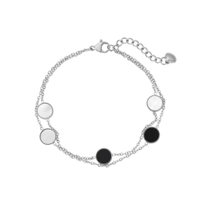 Detailed view of dual-layer titanium steel bracelet with shell and onyx-like pendants
