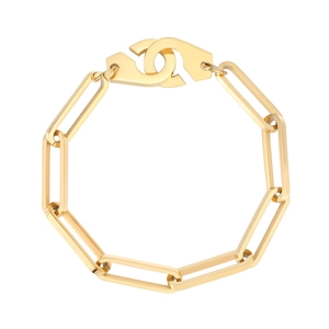 Minimalist gold titanium paperclip chain bracelet with a stylish handcuff clasp design