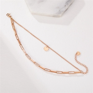Elegantes zweischichtiges Titanstahl-Armband in Roségold mit Rundanhänger und Herzanhänger