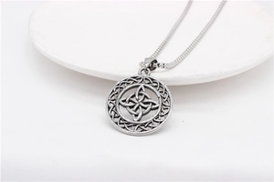 Detailed view of vintage Viking Celtic knot pendant in matte silver steel finish