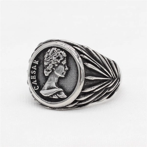 Vintage silver David head ring with Caesar relief and ornate side wing textures