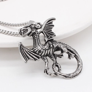 Retro stainless steel dragon pendant necklace with detailed wings and vintage silver finish