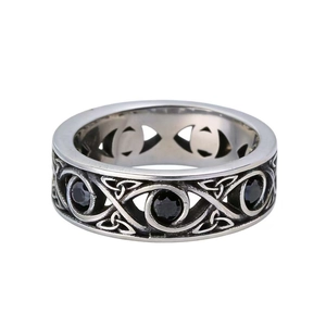 Vintage stainless steel ring featuring Celtic knot patterns and black turquoise stones