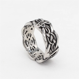 Retro stainless steel Viking ring featuring Celtic knot patterns and musical note engraving