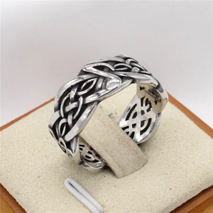 Vintage Viking style wide band steel ring with intricate Celtic knot patterns for men