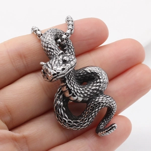 Retro snake pendant necklace in vintage silver finish with detailed scale texture
