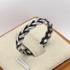 Vintage Viking woven texture steel ring for men with an oxidized silver finish