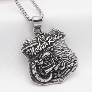 Retro Route 66 motorcycle pendant necklace in silver titanium steel on white fabric