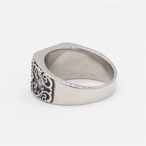 Bague pique rétro en acier inoxydable avec des motifs de volutes gravés
