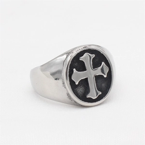 Vintage stainless steel signet ring for men featuring a gothic cross on black surface