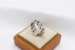 Detail of vintage cuban link chain ring for men in matte titanium steel finish