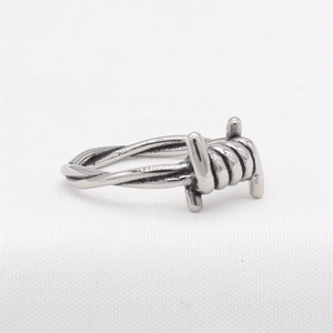 Retro punk barbed wire style ring in silver titanium steel for men with industrial design