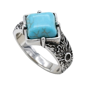 Vintage stainless steel ring featuring square blue turquoise with engraved tribal patterns