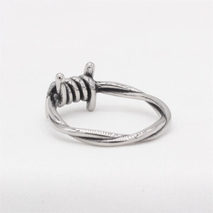 Retro punk style barbed wire ring in vintage stainless steel finish for men