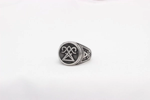 Macro shot of Viking sigil ring with vintage matte finish and occult engraving detail