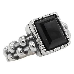 Retro silver ring with large rectangular black gemstone and beaded woven band