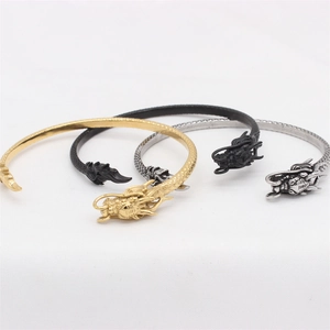 Vintage Drachenkopf-Armreifen aus Edelstahl in Gold Schwarz und Silber Optik