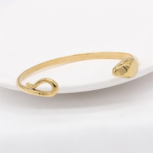 Minimalist gold snake-shaped open bangle featuring a sleek abstract animal design for men