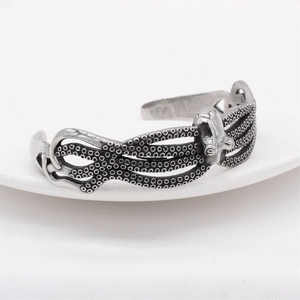 Retro stainless steel octopus cuff bracelet with realistic tentacle texture and vintage finish