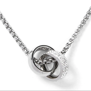 Elegant silver interlocking double ring necklace with cubic zirconia on a box chain