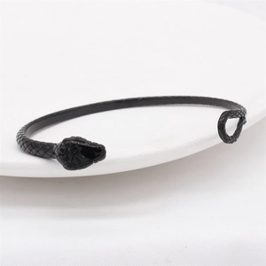 Vintage matte black snake-shaped open bangle featuring detailed scale textures