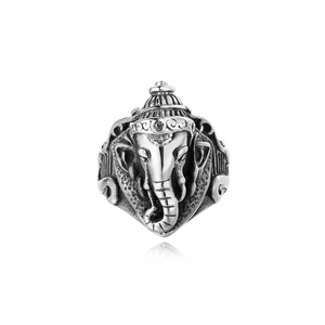 Detailed macro view of retro stainless steel Ganesha ring with intricate religious carving