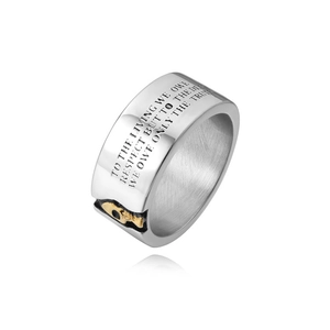 Detail of wide stainless steel ring featuring vintage skull ornament and engraved quote