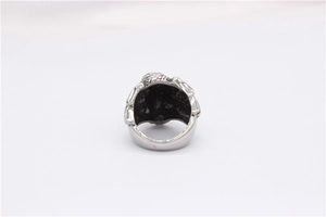 Detailed back view of vintage eagle snake ring showing thick band and aged silver finish