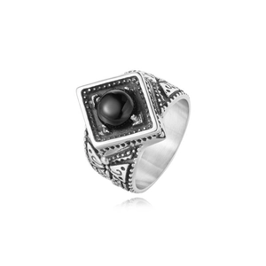 Detailed view of vintage silver steel signet ring with a large square black gemstone