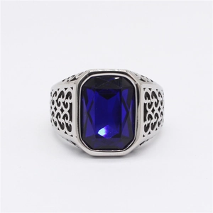 Vintage rectangle blue sapphire gemstone ring with ornate silver steel band