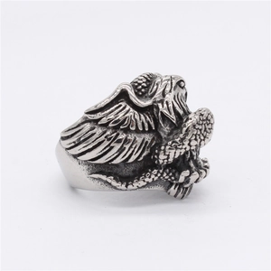 Retro stainless steel eagle ring for men featuring detailed feather carvings and a vintage finish
