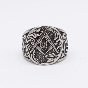 Vintage stainless steel Freemason ring featuring compass G logo and ornate engraving